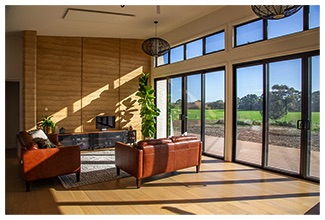 Rammed earth has superior thermal properties and fantastic aesthetics